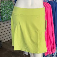 You Are Going To Love The Flattering Fit Of These Skorts! You Will Want One In Every Color! It Is So Cute & Comfy And Can Be Worn Dressed Up But Also For Casual/Athletic Look. Wear Playing Tennis Or Golf; Or For Just Running Errands. Pull-On Skort With Optional Zip Side-Slip Zip Back Pocket, Small Front Pocket Sewn-In Shorts Upf50+ Sun Protection Fabric Length 17 Inches Pre-Shrunk 92% Nylon / 8% Spandex Style No. Spx3148 Made In China Beach Fitted Skort With Pockets, Beach Skort With Stretch And Pockets, Casual Green Skort With Short Inseam, Casual Skort With Pockets For Vacation, Casual Vacation Skort With Pockets, Green Beach Skort With Built-in Shorts, Beach Green Skort With Built-in Shorts, Green Skort With Built-in Shorts For Beach, Green Beach Skort