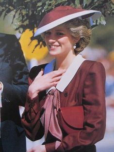 a woman wearing a red and white hat