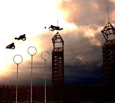 two people are in the air doing tricks on their skateboards