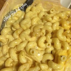 macaroni and cheese in a bowl with a spoon