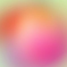 an abstract blurry background in pink and green