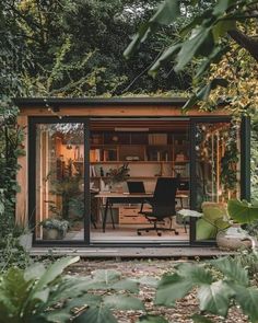 a small office in the middle of some trees