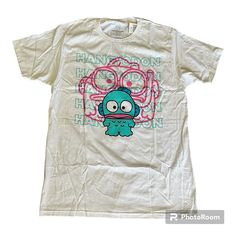 Hangyodon Name Boyfriend Fit Girls T-Shirt We've Got A New Sanrio Style That Will Go Swimmingly In Your Collection! Rep Hangyodon With This Tee, Featuring The Cutie Posed Over A Close-Up Of His Face And His Name Repeated In The Background. Please Note: Style Runs Large; Size Down For A Tighter Fit. 100% Cotton Wash Cold; Dry Low Imported Listed In Junior Sizes Large New With Tags Unisex White T-shirt With Cartoon Print, Casual Unisex White Shirt, Sanrio Shirt, Name Boyfriend, Jellyfish Shirt, Sanrio Style, Sanrio Hangyodon, Embroidered Tee Shirt, Teal Shirt