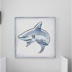 a baby's room with a painting of a shark on the wall