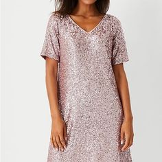 Light Pink, Sequin, Shirt Style Dress, Fully Lined. I Bought This To Wear For My Daughters Wedding And Chose To Wear A Long Dress To It Instead. This Is A Really Cute And Comfortable Dress. From My Personal Closet 21 1/2 “ Under Arm To Under Arm 32” V Next To Bottom Of Dress Holiday Bridesmaid V-neck Dress, Glamorous Short Sleeve Mini Dress For Wedding, Holiday V-neck Bridesmaid Dresses, V-neck Bridesmaid Dress For Holiday, Shirt Style Dress, Daughters Wedding, Pink Sequin Dress, Personal Closet, Sequin Shirt