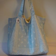 *Nwt Womens Tina Demel Boutique Light Blue, White Paisley Soft Bandana Tote Bag No Closure Retail: $98 Material: Fabric Measurements: Height: 15" Width: 21" Depth: 7" Strap Drop: 10" Nwt, New With Tags. ..Tin-Ros-1** Everyday Use Bags With Paisley Print, Reversible Blue Shoulder Bag For Beach, Reversible Blue Shoulder Bag For The Beach, Summer Blue Hobo Bag, Summer Blue Hobo Bag For Everyday, Blue Reversible Hobo Bag For Everyday Use, Blue Reversible Hobo Bag For Travel, Bandana Tote Bag, Boutique Lighting