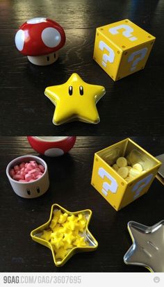 some toys that are sitting on a table and one has a star shaped object in the middle