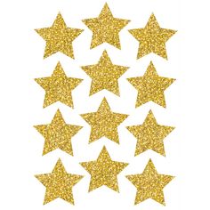 gold glitter stars are arranged in the shape of five pointed stars on a white background