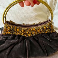 Beautiful Brown Velvet Handheld Bag With Beaded And Gold Ring Handles. Beautiful Beading And Plush, Luxurious Feel. Never Used, Still Has Tags On. Can Be Dressed Up For Evening Or Dressed Down For Dinner Out. Brown Embellished Evening Bag, Embellished Brown Shoulder Bag For Party, Brown Embellished Shoulder Bag For Party, Party Brown Embellished Shoulder Bag, Beaded Brown Evening Bag For Party, Embellished Brown Evening Bag, Embellished Brown Evening Bag For Party, Evening Brown Beaded Shoulder Bag, Elegant Embellished Brown Bag