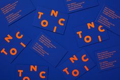 blue business cards with orange letters on them that say no to icicinoc