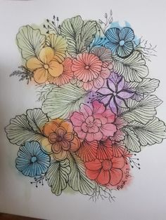 a drawing of flowers on a white paper