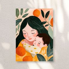 a woman holding a child in her arms with oranges on the wall behind them