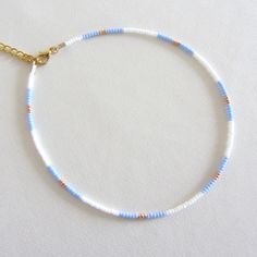 Blue bead choker white beaded choker gold bead choker colorful bead choker seed bead choker boho bead choker summer necklace trendy choker Measure the length of your neck with a measuring tape or you can use any thread, rope, or cable for telephone and after apply the measurements to a regular ruler. These are multi-colored, opaque shiny beads of size 10/0. Choker is 13 inches with a 2 inches adjustable extender chain. 15 inches full length. Summer Choker Necklace, Summer Seed Bead Bracelet Ideas, Seed Beads Necklace Ideas, Summer Necklace Diy, Seed Bead Necklace Ideas, Summer Beaded Necklace, White Bead Necklace, Summer Necklaces, White Beaded Necklace