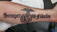 a man with a tattoo on his arm that says,'super soldier'and an eagle