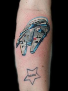 a star trek ship tattoo on the arm