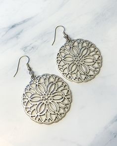 These large disc filigree earrings are made of antique silver including antique silver ear wires. They measure approximately 40mm round and have a 2 1/2" drop. Filigree Earrings, Silver Flowers, Ear Wires, Flower Power, Antique Silver, Crochet Earrings, Etsy Earrings, Etsy Uk, Flowers