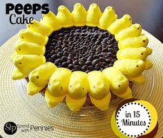 there is a cake decorated like a sunflower with chocolate chips in the shape of bananas