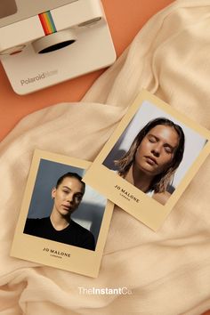 two polaroid photos on top of a bed next to a hairdryer and comb