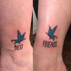 two matching tattoos with the words best friends and blue leaves on their ankles, one is in black ink