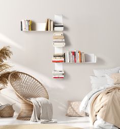 a bedroom with white walls and shelves filled with books