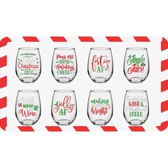 six wine glasses with holiday sayings on them