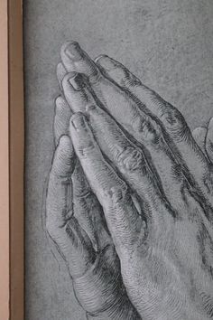 a drawing of two hands holding each other