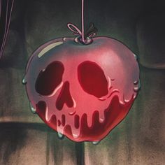 a red apple hanging from a string with a skull on it's head and blood dripping down the side