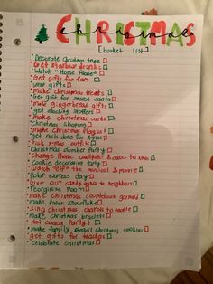 a christmas list is shown on a piece of paper