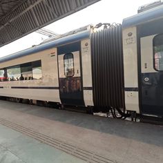 the train is stopped at the station waiting for passengers to get on or off it