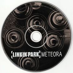 the cd cover for linkin'park metrora is black with white letters on it