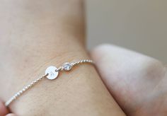 Dainty and Beautiful Personalized Heart Bracelet with CZ - Disc measures 7mm - Each Disc can be personalized with 1 character uppercase, lowercase, hearts and etc. - CZ measures approx. 4mm - 14K Gold fill / Sterling silver PLEASE READ BELOW BEFORE PURCHASE --------------------------------------- Heart BRACELET with CZ : https://www.etsy.com/listing/254691426/personalized-heart-initial-bracelet-with?ref=shop_home_active_1 More BRACELETS CAN BE SEEN HERE: https://www.etsy.com/shop/EandEProject?se Personalized Heart Bracelet, Disc Bracelet, Bracelet Initial, Initial Bracelet, Mom Necklace, Personalized Initials, Girls Jewelry, Heart Bracelet, Fantastic Gifts