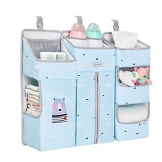 a blue toy organizer with baby items in it