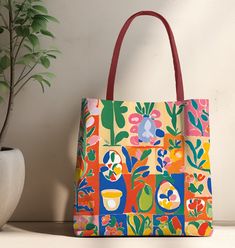 This design has all the colors of Spring. A perfect bag for all your beach paraphernalia, or great for shopping or as a book bag, for knitting - anything! Available in three sizes to add both versatility and style, these polyester tote bags come with a choice of handle colors. Featuring double-stitched seams, cotton webbing straps, and nonwoven laminate lining for high-end durability. One single storage compartment (no pockets), and no closure. Small: 13 x 13in; Medium: 16 x 16in; Large 18 x 18i Square Canvas Bag For Summer Shopping, Casual Multicolor Canvas Shopping Bag, Trendy Red Rectangular Beach Bag, Multicolor Large Capacity Beach Bag For Daily Use, Colorful Casual Bags For Daily Use, Playful Bucket Bag For Everyday Use, Colorful Summer Bags For Daily Use, Playful Summer Bags For Daily Use, Red Tote Beach Bag For Everyday Use