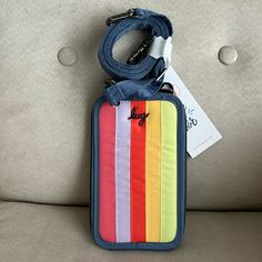 Lug’s Newest Phone Bag And Wallet Combined In New Vertical Stripes. Each Stripe Is A Part Of The Icepop Collection, Starting With Watermelon On The Left, Followed By Sugarplum, Papaya, Banana, And Margarita And Surrounded By A Blue Moon Icepop Border And Strap. Comes With An Adjustable And Removable Crossbody Strap And A Small Removable Top Handle. Retails For $54 On The Lug Website. Taken Out Of Plastic For Photos. Multicolor Rfid Blocking Bags For Daily Use, Multicolor Daily Use Bags With Rfid Blocking, Functional Blue Phone Bag With Cell Phone Pocket, Blue Bags With Rfid Blocking For Daily Use, Multicolor Rfid Blocking Travel Bag, Blue Rectangular Rfid Blocking Bag, Functional Blue Rectangular Phone Bag, On-the-go Nylon Shoulder Bag With Luggage Sleeve, On-the-go Nylon Luggage With Adjustable Strap