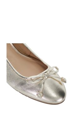 A delicate bow tops the rounded toe of a ballerina-style pump set on a low heel. Leather upper/synthetic lining/rubber sole Imported Chic Party Ballet Flats With Closed Toe, Fitted Low Heel Party Ballet Flats, Fitted Ballet Flats With Flat Heel For Party, Fitted Low Heel Ballet Flats For Party, Chic Closed Toe Ballet Flats For Party, Feminine Ballet Flats With Bow, Feminine Evening Ballet Flats, Feminine Evening Ballet Flats With Flat Heel, Feminine Pointed Toe Ballet Flats For Party