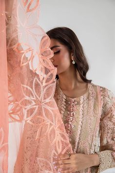 Royal Beige and Tea Pink Luxury Pret Long Shirt Pakistani Salwar Kameez is Intricately detailed silhouette that captures the brilliance of artistry and celebrates craftsmanship with a nod to modern sensibilities. Detailed Description: SKU: PB710 Detailing: Embroidery, Threads, Floral Designs Color: Beige and Tea Pink Fabric: Chiffon, Organza Design: Fully Embroidered Dress Event: Festive, Party wear Dress Event, Pink Luxury, Luxury Pret, Pakistani Salwar, Pakistani Salwar Kameez, Embroidery Threads, Pink Fabric, Long Shirt, Floral Designs