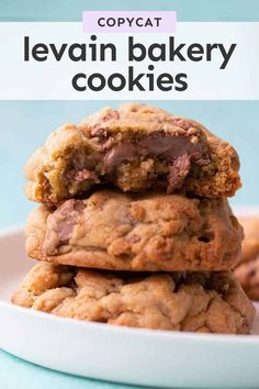 two chocolate chip cookies stacked on top of each other with the words copycat leviin bakery