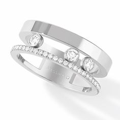 two white gold rings with diamonds on them