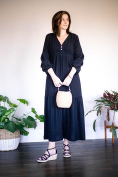 Love this easy dress from Anthropologie. It is perfect for cooler spring and summer days. Dress it up with sandals or run around town with sneakers. #styledahlia #anthropologie #anthro #blackdress #lbd #springstyle #summerstyle #dresses #ShopStyle #Lifestyle #Vacation Easy Dress, Strap Wedge, Tiered Maxi Dress, Wedge Sandal