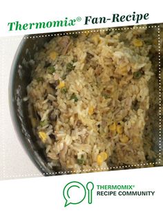 a pan filled with rice and vegetables on top of a white countertop next to the words thermomiia fan - recipe