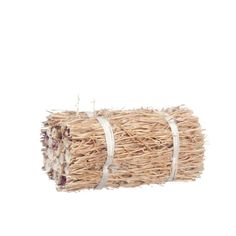 a roll of straw with white ribbon on it