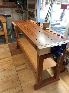 a workbench made out of wood in a workshop