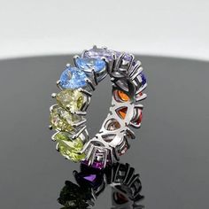 a multi colored ring sitting on top of a table