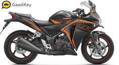 an orange and black motorcycle is shown on a white background with the words gaddikey above it