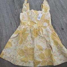 Cute For Spring Or Summer! Gap Baby Apron Dress Yellow Flower Print Flutter Sleeve Zip Side Lined Size 3y Cute Floral Print Sundress For Dress-up, Spring Floral Print Sundress For Playdate, Spring Floral Sundress For Playdate, Spring Sundress With Ruffles For Playdate, Summer Floral Print Dress For Playdate, Gap Cotton Dresses For Spring, Beach Floral Sundress For Babies, Beach Sundress With Floral Print For Babies, Gap Summer Mini Dress