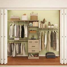 an open closet with clothes, shoes and other items on the shelves in front of it