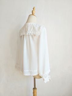 Features: It features ruffled pointed collar, long sleeves, two bowknots on the cuffs, five buttons on&nbsp; the neckline, heart-shaped hem.Attention: This price includes a blouse only, others are not included.&nbsp;Size Chart:Size (CM): Unit CM; Sizes below are measured in flat-laid position, hand measurement will have discrepancy of about 2 CM.Size(cm)XSSMLXLXXLShoulders353637383940Bust8286909498102Sleeve Length565658586060Shirt Length555557575959 Fitted Long Sleeve Top With Detachable Collar, Elegant Long Sleeve Blouse With Detachable Collar, Classic Long Sleeve Blouse With Bow, Fitted Tops With Ruffles And Collar Detail, Fitted Tops With Ruffles And Cute Collar, Elegant Blouse With Doll Collar, White Long Sleeve Blouse With Bow, Chic Blouse With Ruffles And Cute Collar, Long Sleeve Tops With Detachable Collar For Daywear