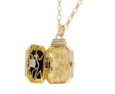 This Sorellina necklace is perfect for adding a touch of playful, edgy elegance to any look. The rectangular tablet of black onyx is topped by a double row of diamonds and set with an 18K yellow gold star encrusted with shimmering diamonds. Push the tiny star on the side to open the locket which hangs from the diamond set bale at the center of the 18K yellow gold chain. total length : just under 20" : 18K yellow gold18K yellow gold, onyx, diamond and sapphire locket : 1 1/4" x 3/4"black onyx : 1 Daniela Villegas, Rebecca Overmann, Edgy Elegance, Vintage Inspired Jewelry, Tiny Star, Single Stone, Yellow Gold Chain, Diamond Set, Gold Star