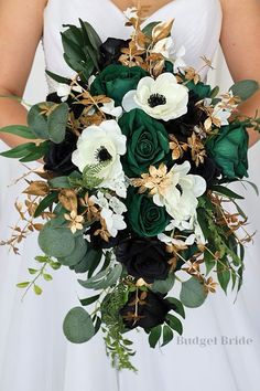 a bridal bouquet with white and green flowers