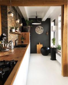 the kitchen is clean and ready to be used as a dining room or office space